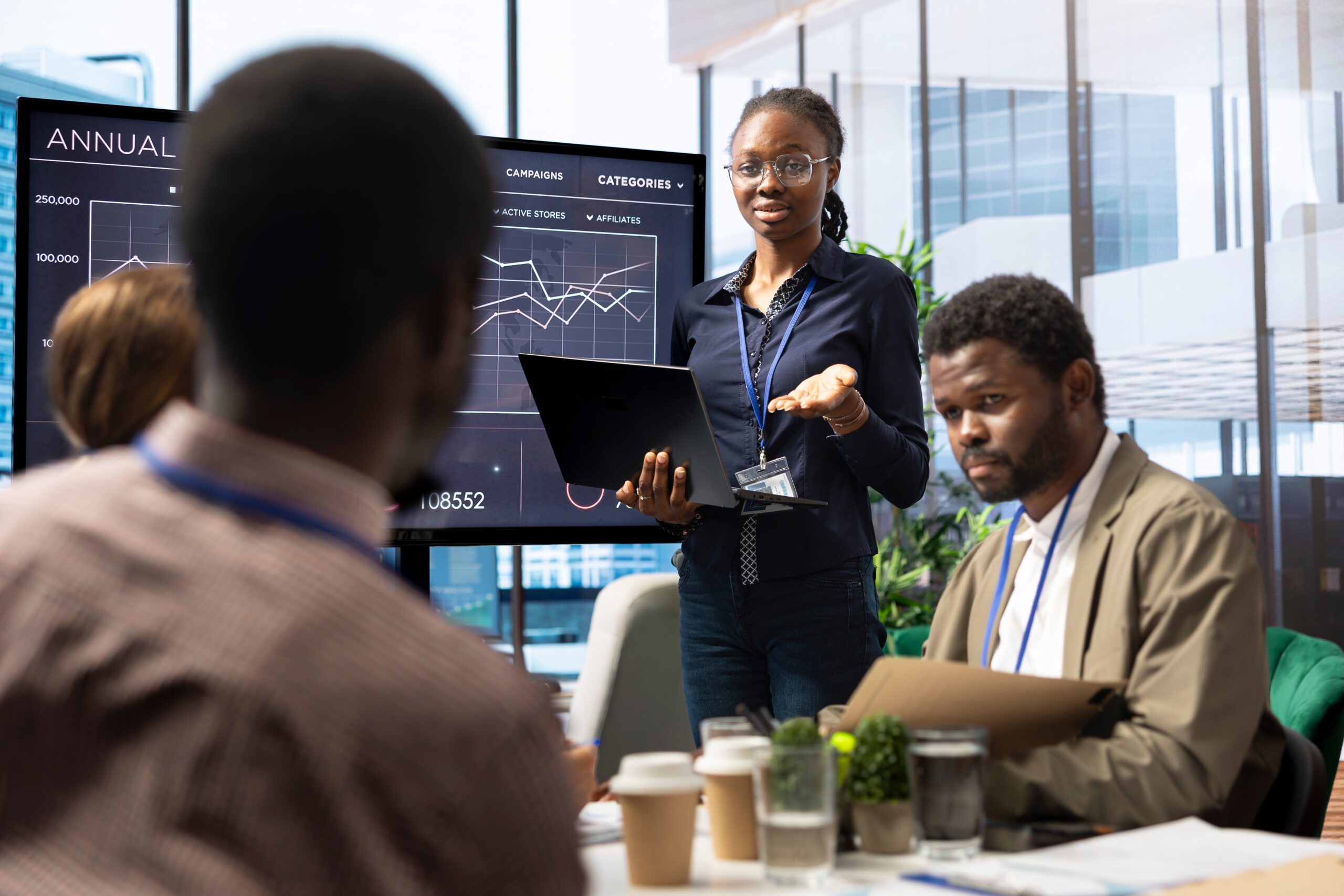 Diverse,Group,Of,Business,Professionals,Meeting,To,Strategize,On,Digital