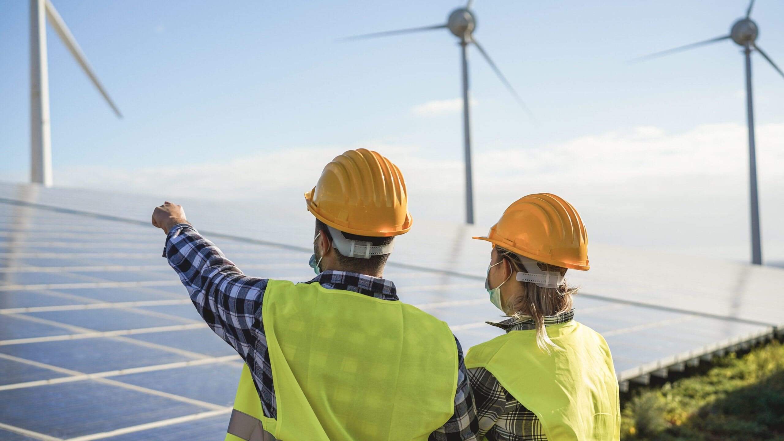 People,Working,For,Alternative,Energy,Farm,-,Wind,Turbine,Power