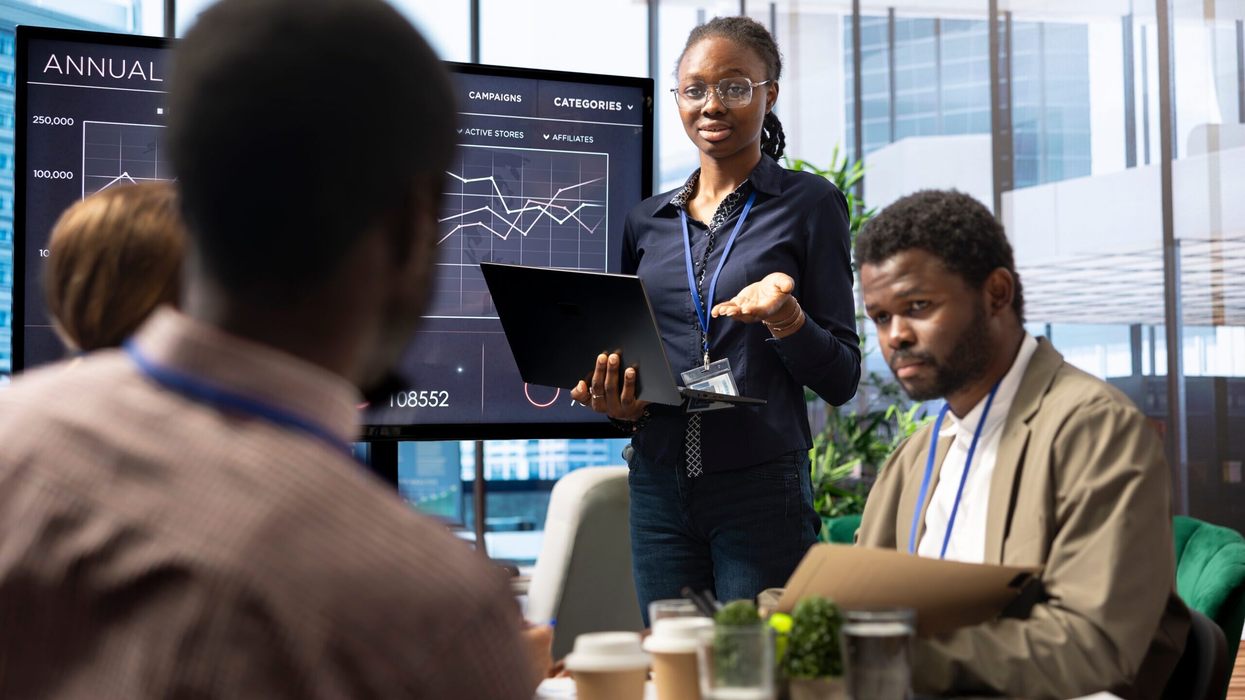 Diverse,Group,Of,Business,Professionals,Meeting,To,Strategize,On,Digital